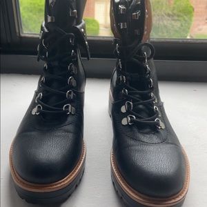 Black and light brown comeback boots.